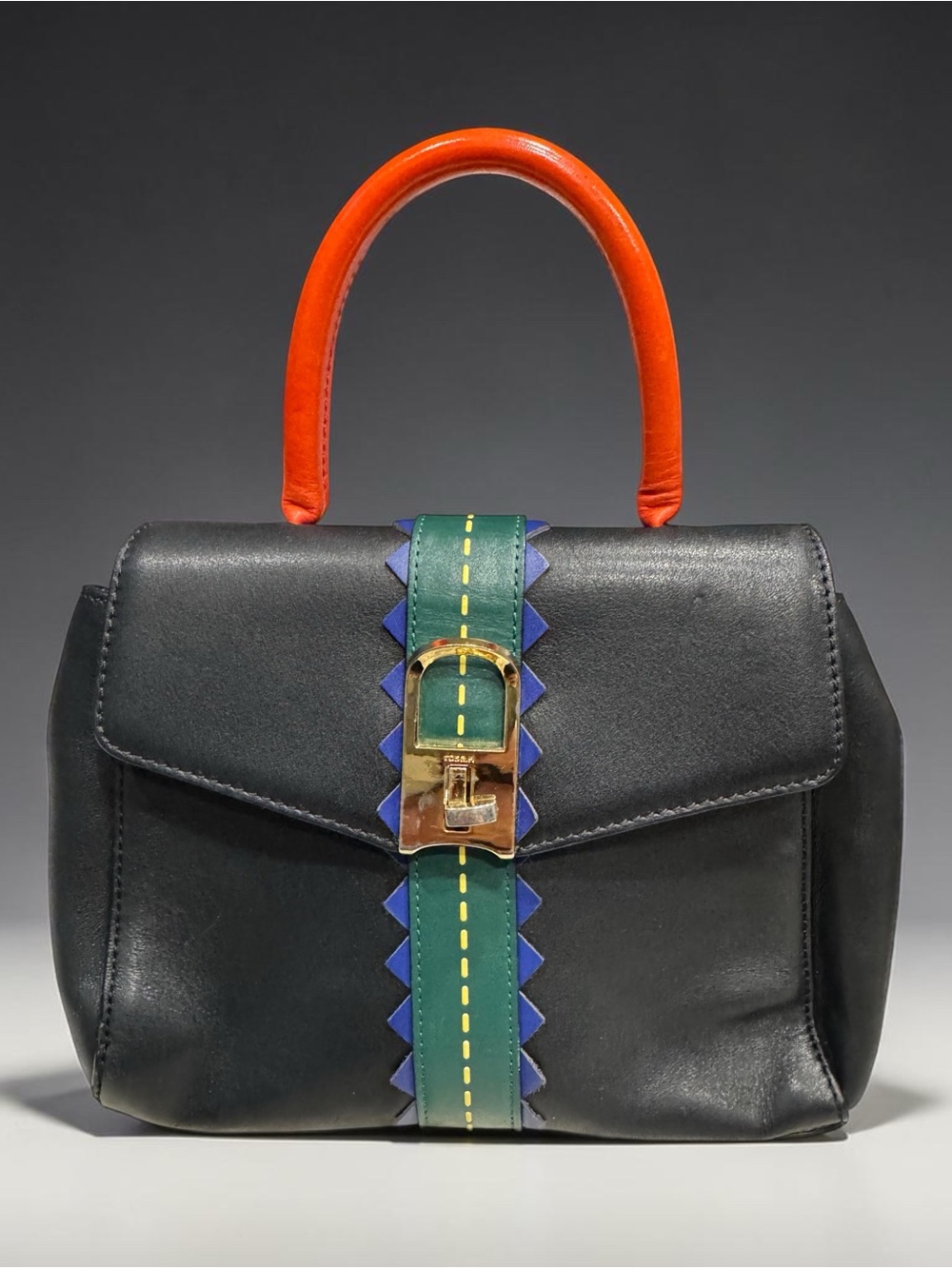 Rosa K. Black Leather Top-Handle Bag with Orange Handle and Green Accent